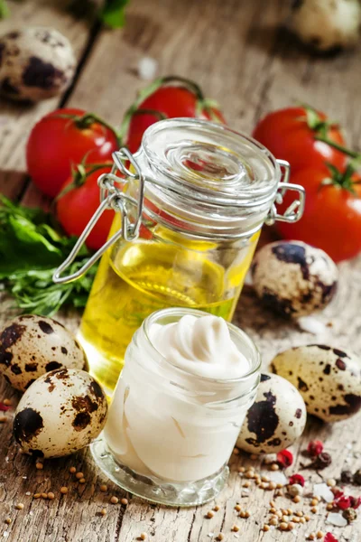 Mayonnaise sauce with quail eggs in a glass jar — 스톡 사진