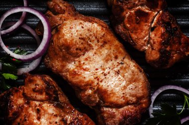 Roasted beef steak with vegetables on the grill pan