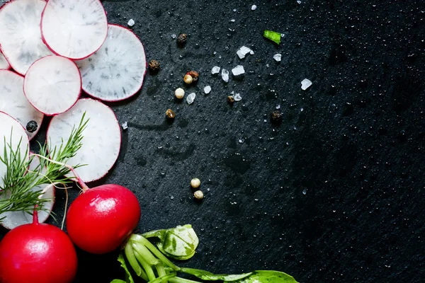 Sliced radish, parsley, dill, salt and spices — Stock Photo, Image