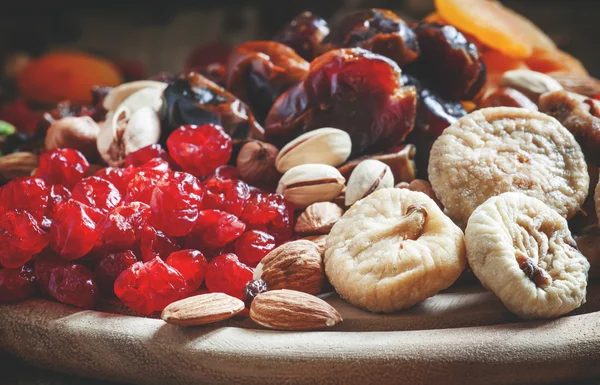 Dried pink cherry, a mix of dried fruits and nuts — Stock Photo, Image