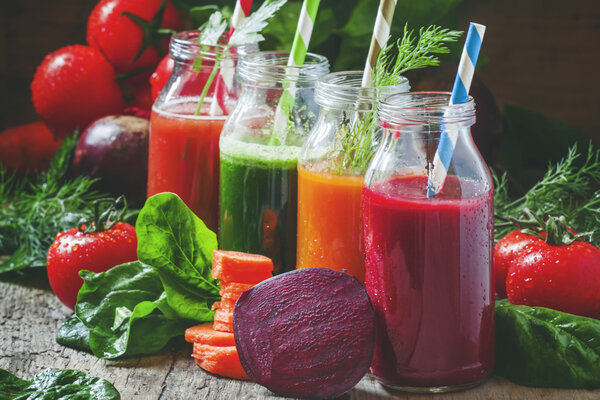 Freshly squeezed vegetable juice in bottles