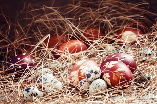 Easter eggs, dyed boiled onion skins with a pattern of herbs