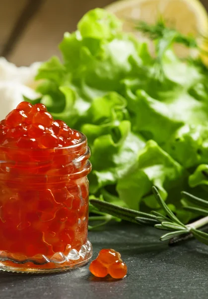 Red caviar with lettuce — Stock Photo, Image