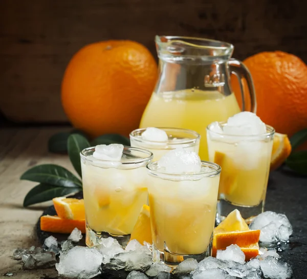 Orange soft drink with juice, vodka and ice — Stock Photo, Image