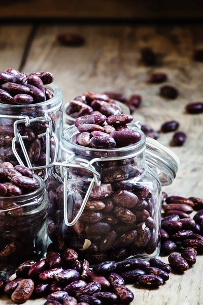 Dry beans in a glass jars — Stock Photo, Image