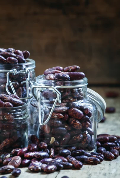 Dry beans in a glass jars — Stock Photo, Image