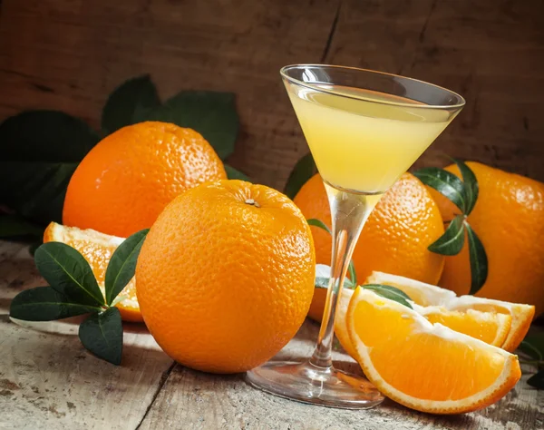 Yellow cocktail with orange juice in a martini glass — Φωτογραφία Αρχείου