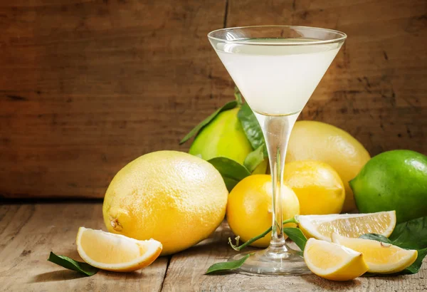 Cocktail with lemon, lime, soda and vodka in a martini glass — Stock Photo, Image