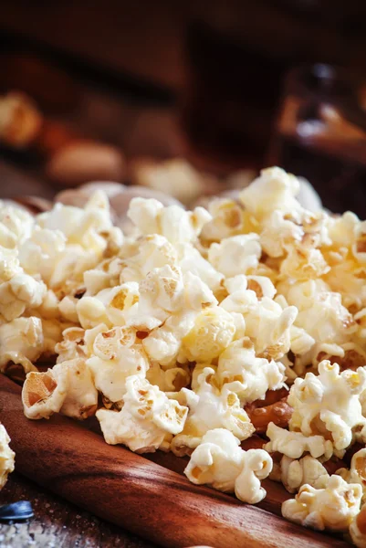 Salty popcorn - snack to beer or cola — Stock Photo, Image
