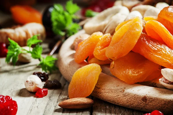 Dried apricots, set of nuts and dried fruits — Stock Photo, Image