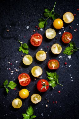 Food background: red, yellow and orange cherry tomatoes