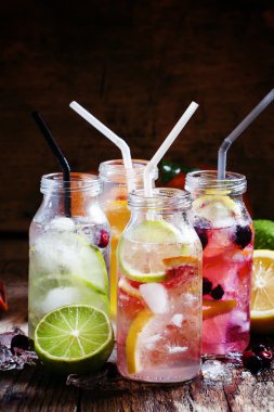 Refreshing lemonades with citrus fruits and ice