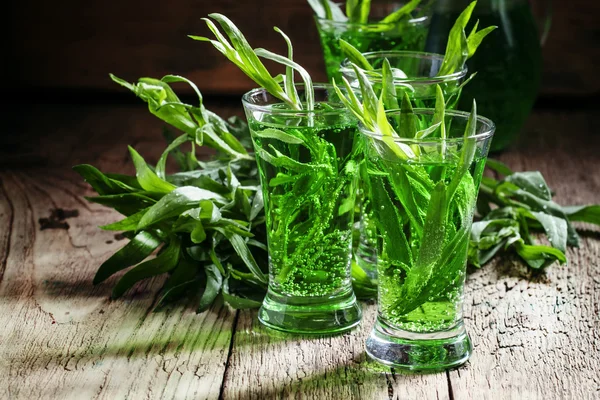 Green fizzy drink with tarragon — Stock Photo, Image