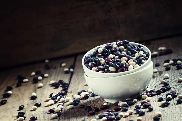 Speckled beans in white china bowls — Stock Photo, Image