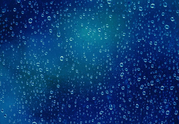 Fondo azul noche con gotas de lluvia —  Fotos de Stock