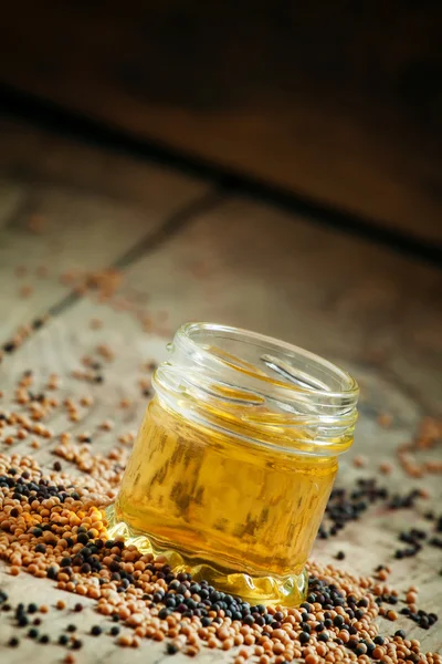 Oil of mustard in a small jar — 스톡 사진