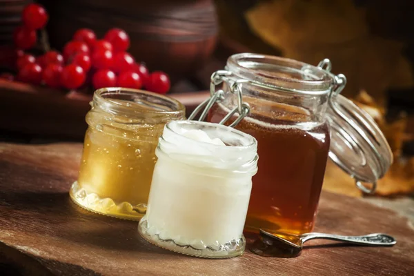 Honey assortment in small jars — Stock Photo, Image