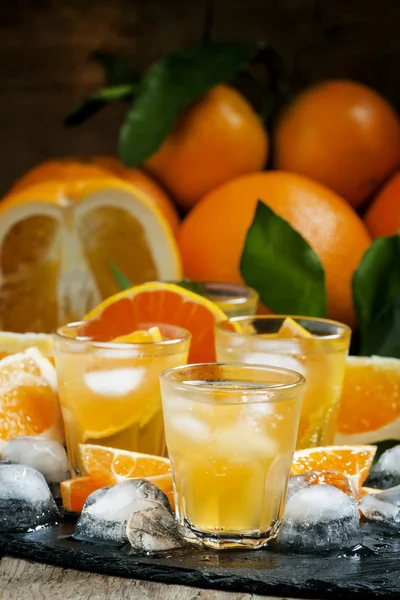 Alcoholic cocktail of orange juice, ice and soda — Stock Photo, Image