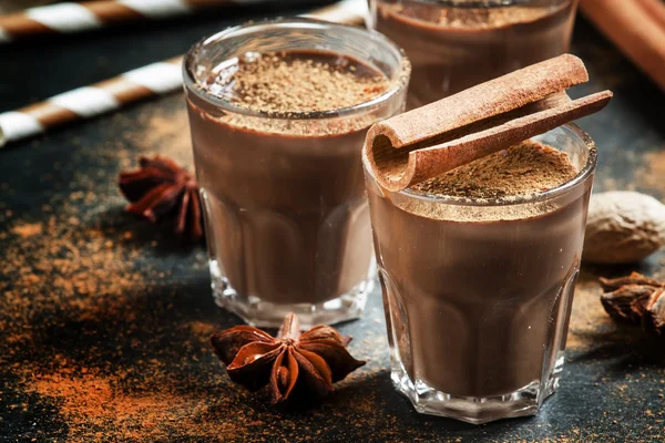 Hot liquid chocolate with warming winter spices — Stock Photo, Image