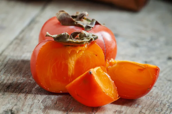 スライスしたセグメント オレンジ柿 — ストック写真