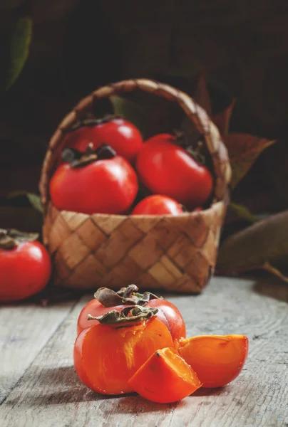 Sliced segments orange persimmons — Stock Photo, Image