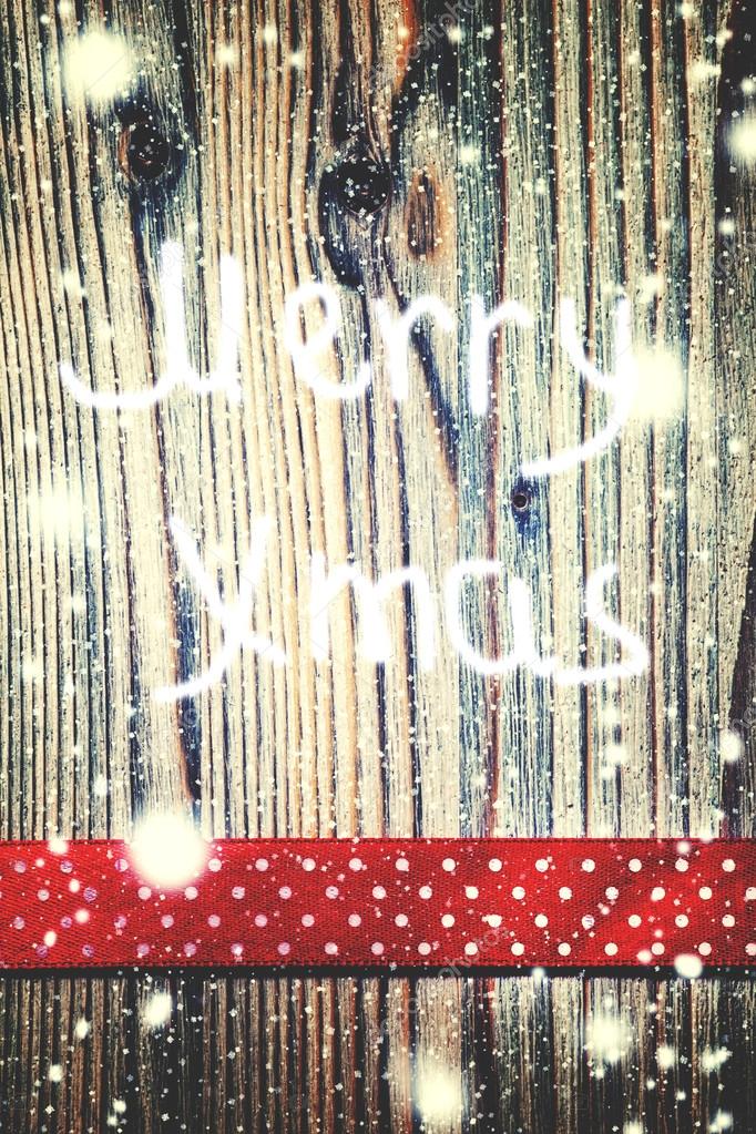 Decorative red ribbon with polka dots on a wooden background Stock