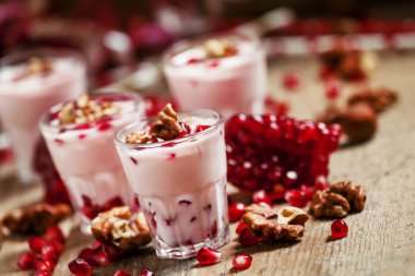 Homemade yogurt with walnuts and pomegranate seeds 