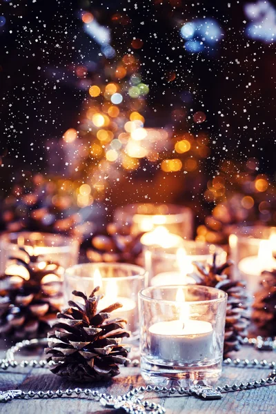 Christmas and New Year's background with candles — Stock Photo, Image