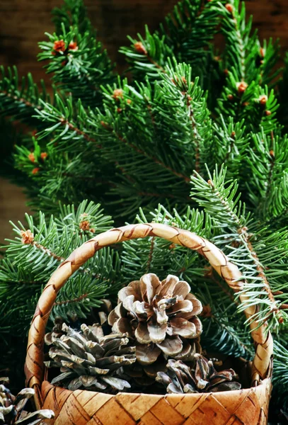 Christmas or New Year composition with wicker basket — Stock Fotó