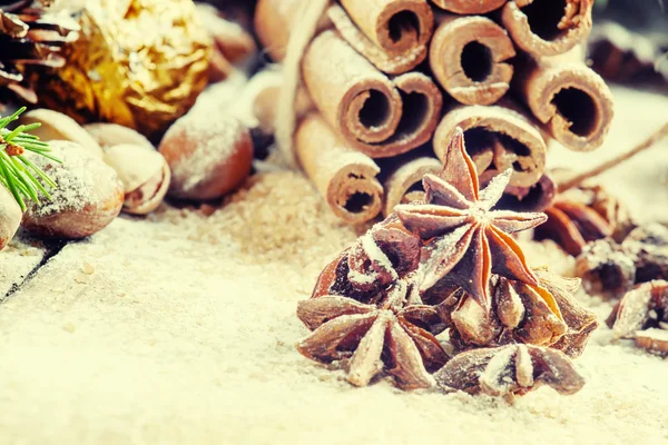 Christmas decoration with cinnamon, anice, pine cones and spruce branches — 图库照片