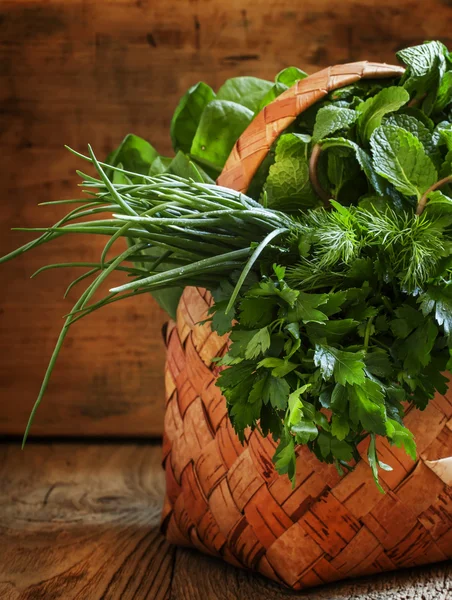 Herbs in a wicker basket — Stock Photo, Image