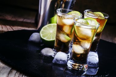Alcoholic cocktail spiced rum with cola