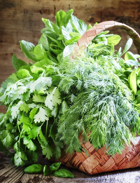 Spicy herbs in a wicker basket — Stock Photo, Image