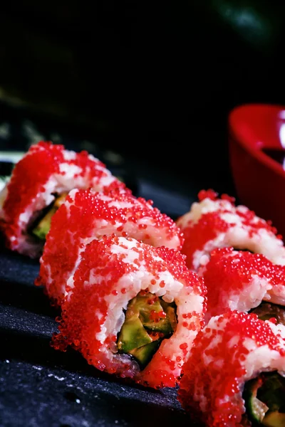 Rolls with caviar, avocado, salmon — Stock Photo, Image