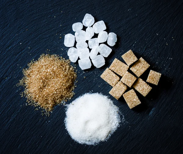 Assortment of sugar: white sand, candy sugar, brown sugar