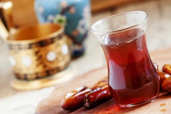 Black tea in traditional Islamic cup — Stock Photo, Image