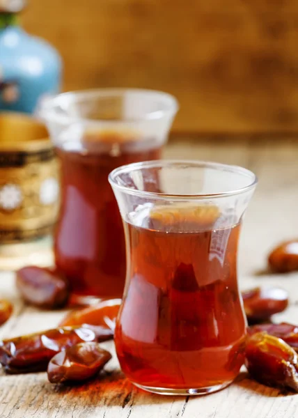 Two cups of black tea  in traditional Islamic cups — Stock Photo, Image