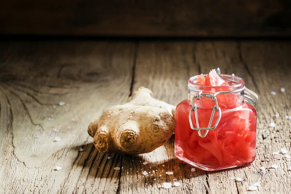 Marinated pink ginger in a glass jar — Stock Photo, Image