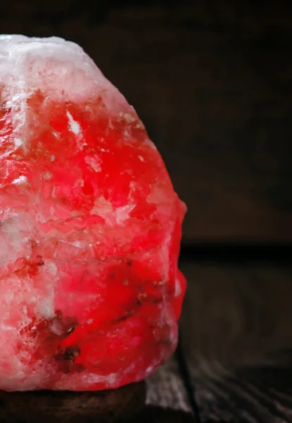 Burning salt lamp of Himalayan pink salt