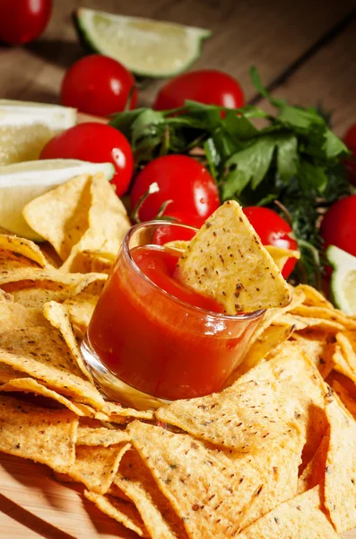 Nachos and tomato sauce — Stock Photo, Image