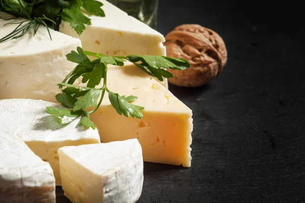 Assorted different kinds of cheese — Stock Photo, Image