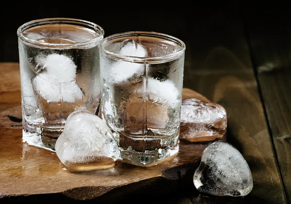 Cold fresh water with ice in a glasses — Stock Photo, Image