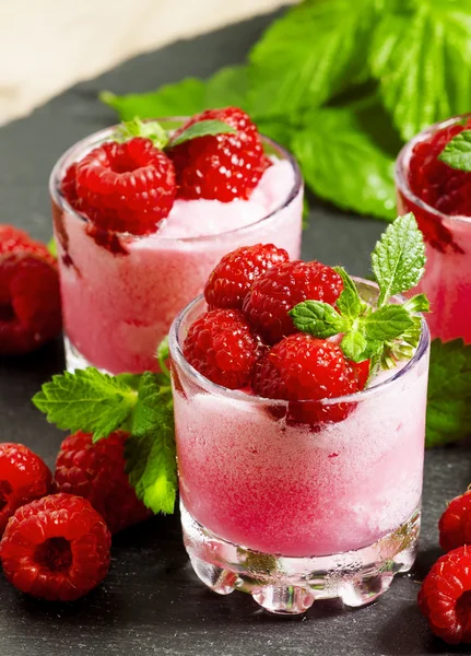 stock image Raspberry granita with berries and mint 