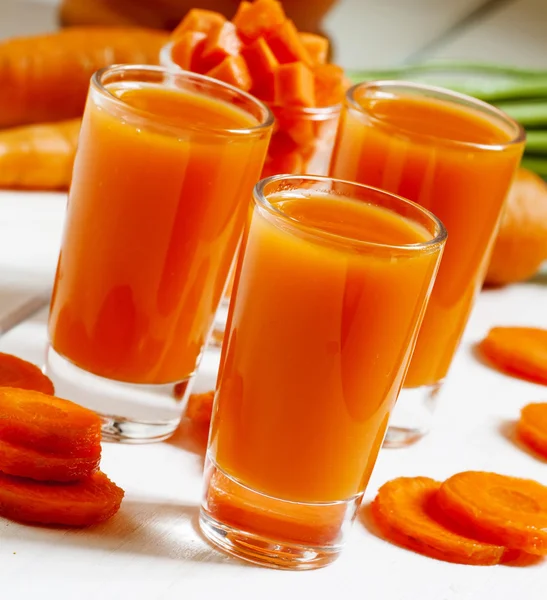 Fresh carrot cocktails in glasses — Stock Photo, Image