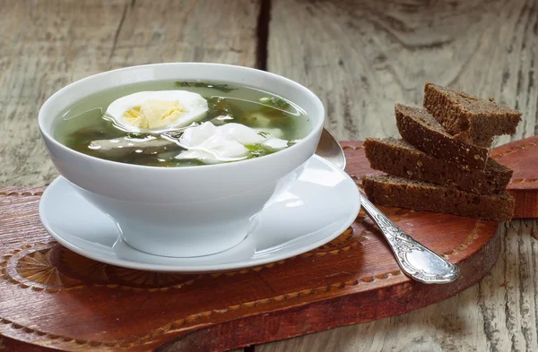 Sorrel soup with meat and eggs in a bowl — Stock Image Sorrel soup with meat and eggs in a bowl Stock Photo