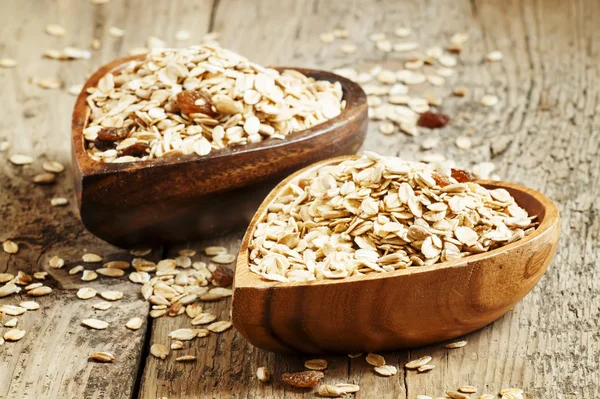 Homemade muesli in a bowls in the shape of a heart — Stock Photo, Image