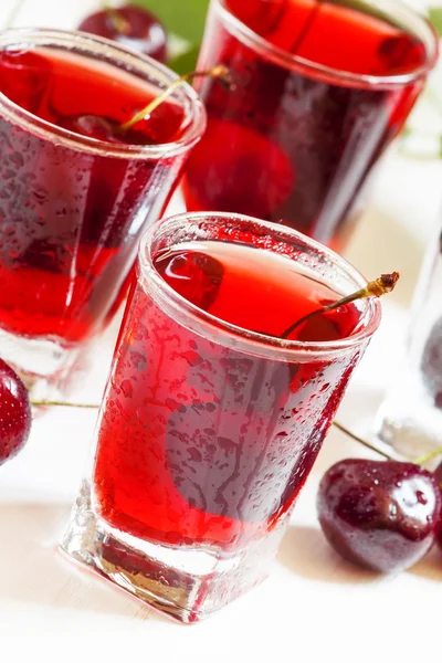 Fresh cherry juice with berries — Stock Photo, Image