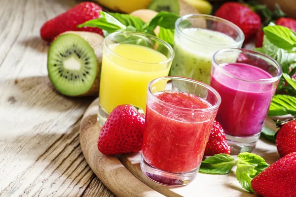 Fruit and berry freshly squeezed smoothies — Stock Photo, Image