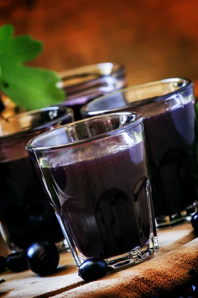 Homemade liqueur made from black currants — Stock Photo, Image