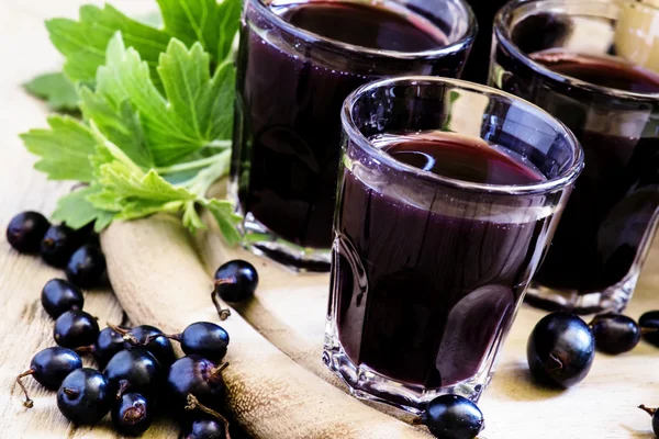 Homemade liqueur made from black currants — Stock Photo, Image